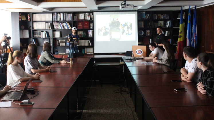 A REPORTING MEETING WITH PROJECT PARTICIPANTS